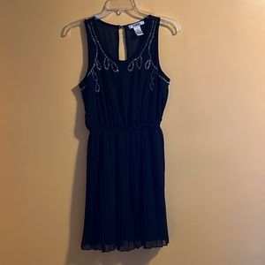 Pinky-Dress in black, embroidered on the top.  100%Polyester